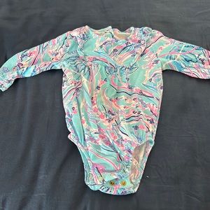 Lilly cotton onesie with ruffles at the collar